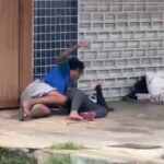 Agressor é preso após ser flagrado esmurrando mulher no meio da rua